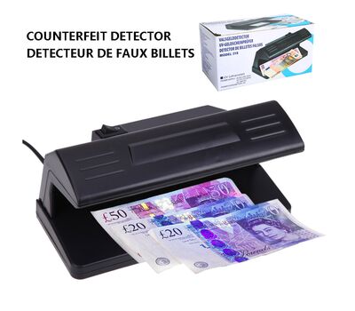 Uv light practical counterfeit bill currency fake paper money detector checker, Model: 318 Computer Accessories